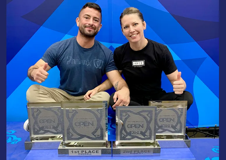 Jamie and Jeremy with team trophies from 2025 IBJJF Tournament